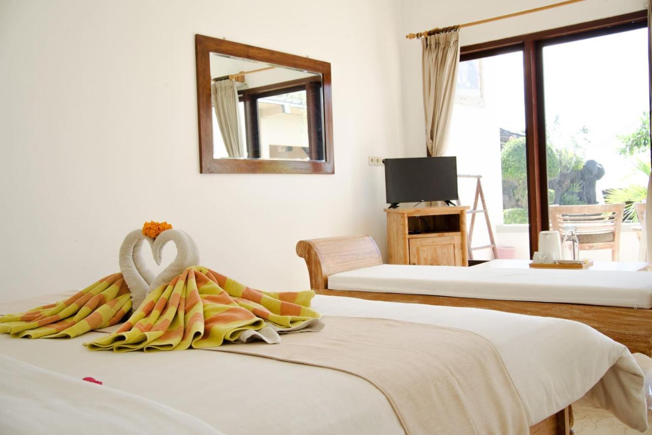 אמד Alam Bali Beach Resort מראה חיצוני תמונה